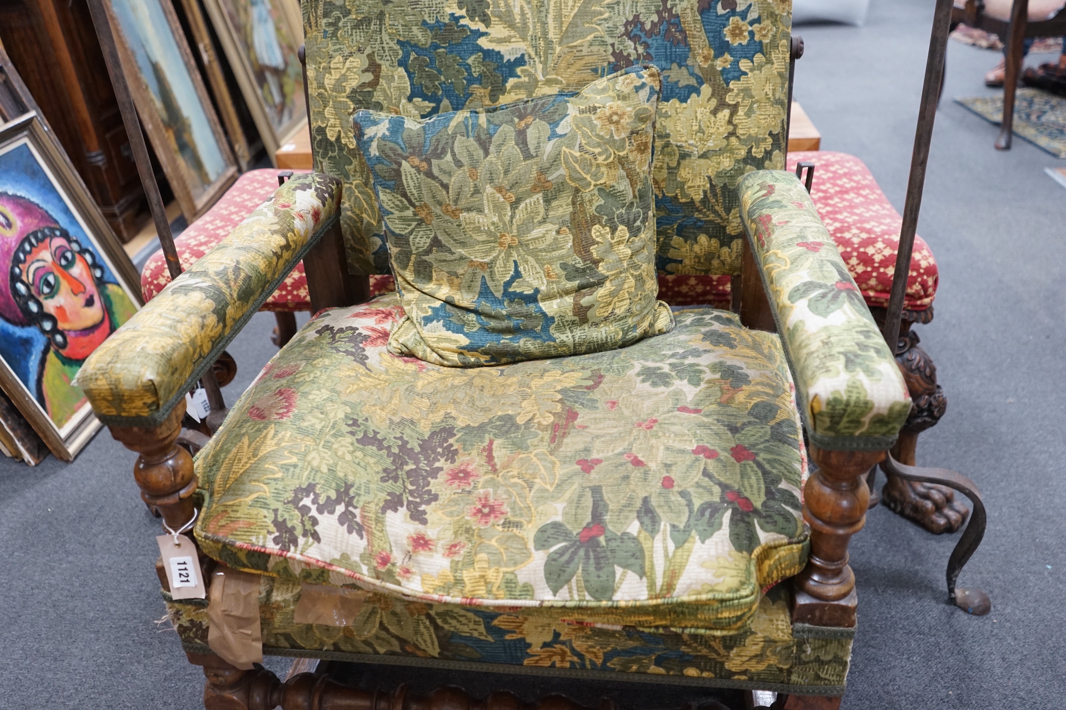 A 19th century French carved walnut reclining armchair, width 74cm, depth 59cm, height 120cm